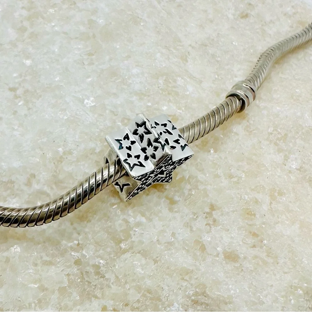 EUC Pandora 790016C01 Sterling Silver Asymmetric Star Charm w/ Clear CZ’s